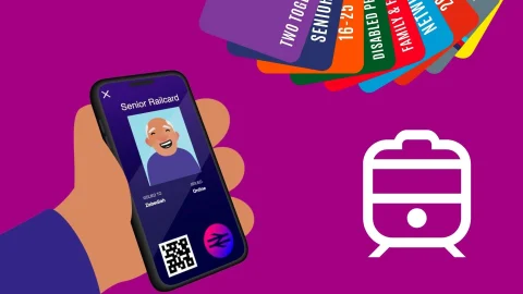 A person holding a physical Railcard, representing travel savings and discounted train tickets across the UK rail network.