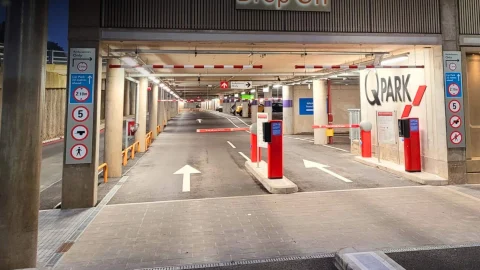 Q-Park multi-storey car park facility with modern signage and secure parking bays for city centre vehicle storage.