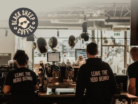 Black Sheep Coffee brand logo and packaging. Premium coffee, roasted beans, coffee bags, coffee shop.