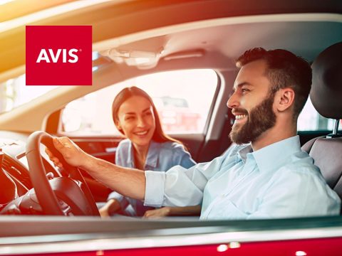 Avis UK Avis car rental cover - promotional image for car rentals and travel deals. Rental cars, travel, Avis logo.