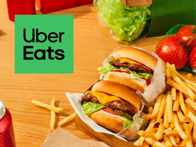 Uber Eats food delivery banner, delicious meals, restaurant deals, food ordering app, fast delivery, food discounts, online ordering.