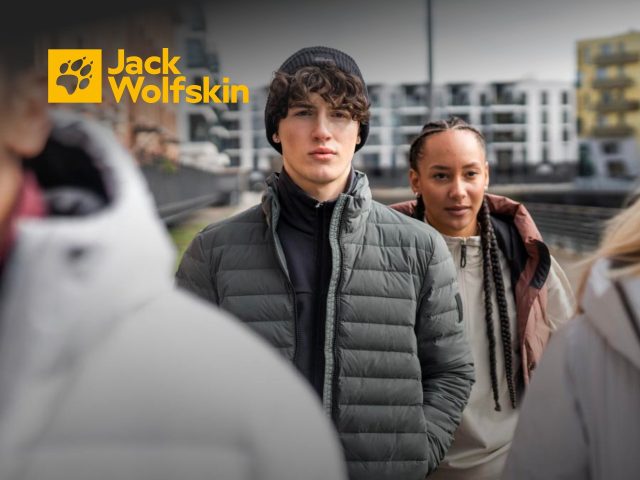 Jack Wolfskin hiking jacket on a mountain landscape, outdoor apparel, waterproof jacket, winter hiking gear, sale