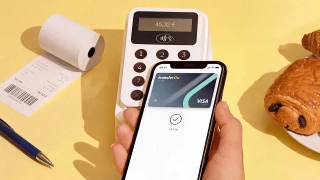 TransferGo international money transfer service on a smartphone screen for fast and secure global payments.