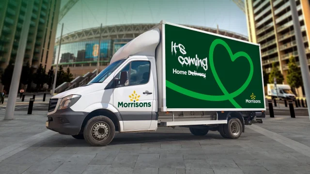 Morrisons online shopping homepage featuring grocery deals and fresh food offers for home delivery.