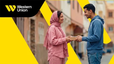 Western Union branding on a digital screen, representing international money transfers and financial services.