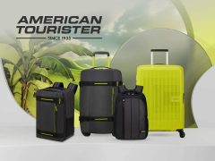 American Tourister luggage cover, protective sleeve for carry-on bags, durable travel protection.