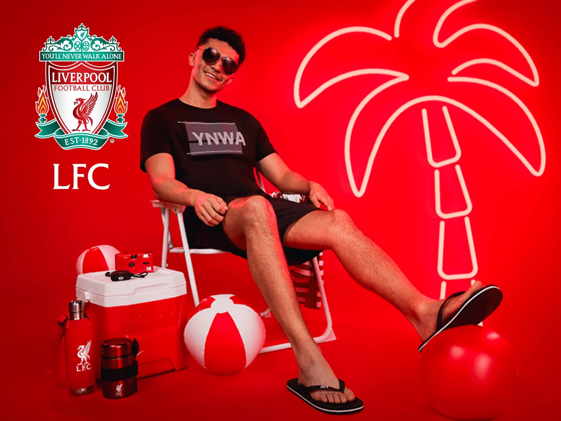 Liverpool FC store cover featuring team merchandise, apparel, and latest football gear. Official store branding.