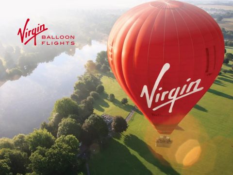 Virgin Galactic space tourism balloon flight, stunning view from above. Luxury space travel, suborbital flights, adventure tourism, space exploration.