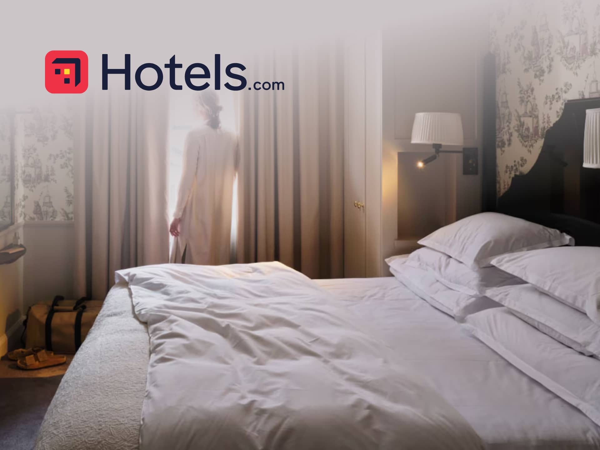 Hotels.com Discount Code Luxury hotel room with a view, Hotels.com booking available. Comfortable bed, modern decor. Travel and accommodation deals.