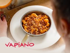 Vapiano restaurant cover image. Modern design with Vapiano logo and menu highlights. Italian cuisine, coffee, and healthy options.