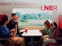 LNER train cover, London North Eastern Railway branding, scenic railway travel, train journey, UK rail.
