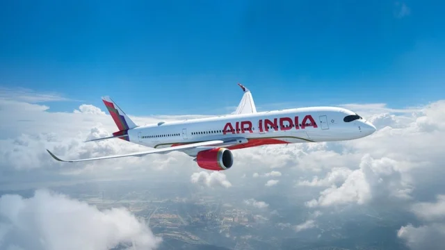 Air India passenger aircraft flying in the sky, representing premium international travel and airline services.