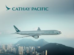 Cathay Pacific Airways cover image. Luxurious airplane interior, premium travel, Hong Kong, Asia. Airline branding, flight deals, travel promotions.