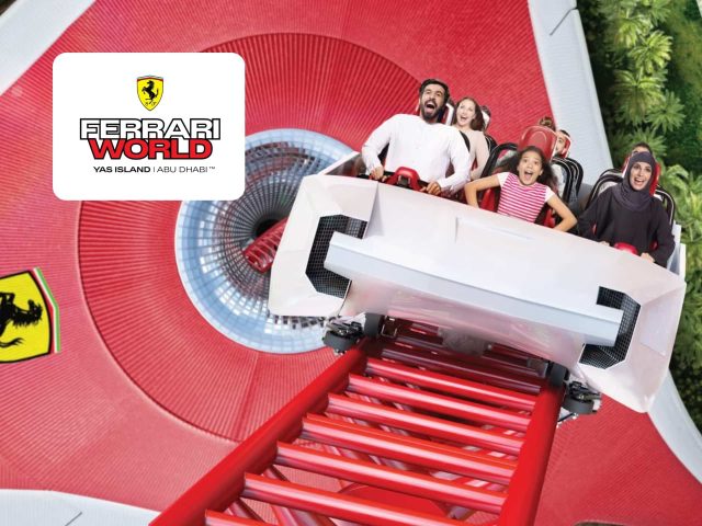 Ferrari World Abu Dhabi Ferrari World Abu Dhabi: Iconic red Ferrari logo against a vibrant sky. Theme park in Abu Dhabi, UAE.