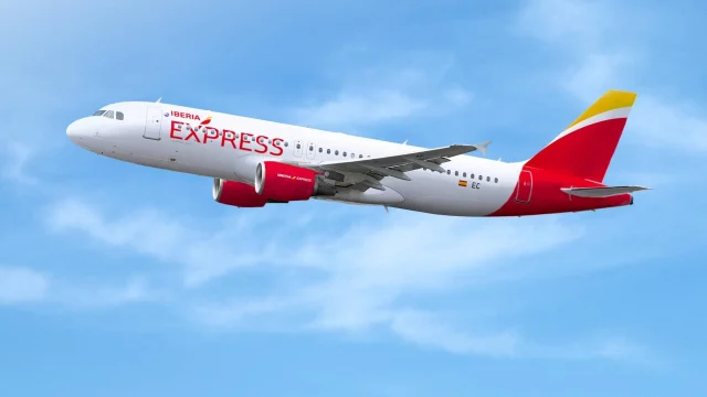 Iberia Express aircraft parked at an airport terminal, representing budget-friendly air travel and flight bookings.