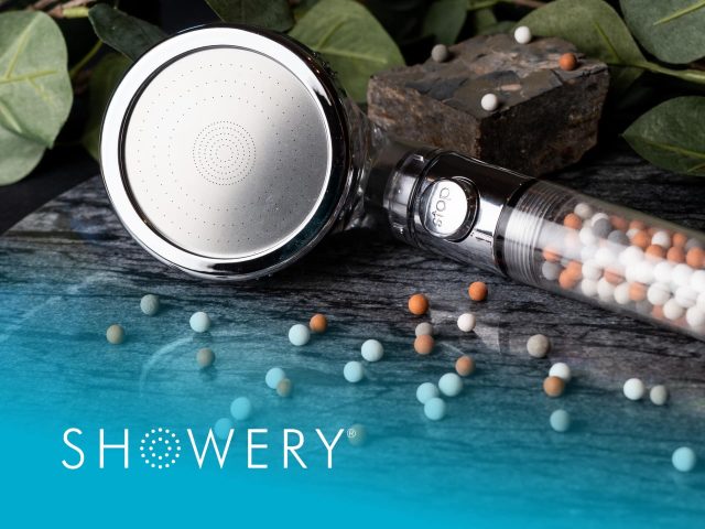 Showery Showery brand cover photo featuring a modern shower setup with rainfall showerhead and glass enclosure. Perfect bathroom design inspiration.