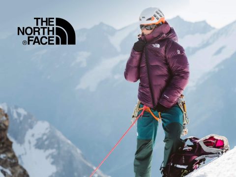 The North Face The North Face logo on a scenic outdoor background, perfect for adventure. Explore The North Face apparel and gear.