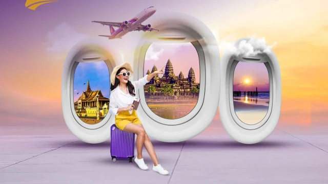 Air Cambodia passenger aircraft flying over a scenic landscape, representing affordable travel and flight bookings.