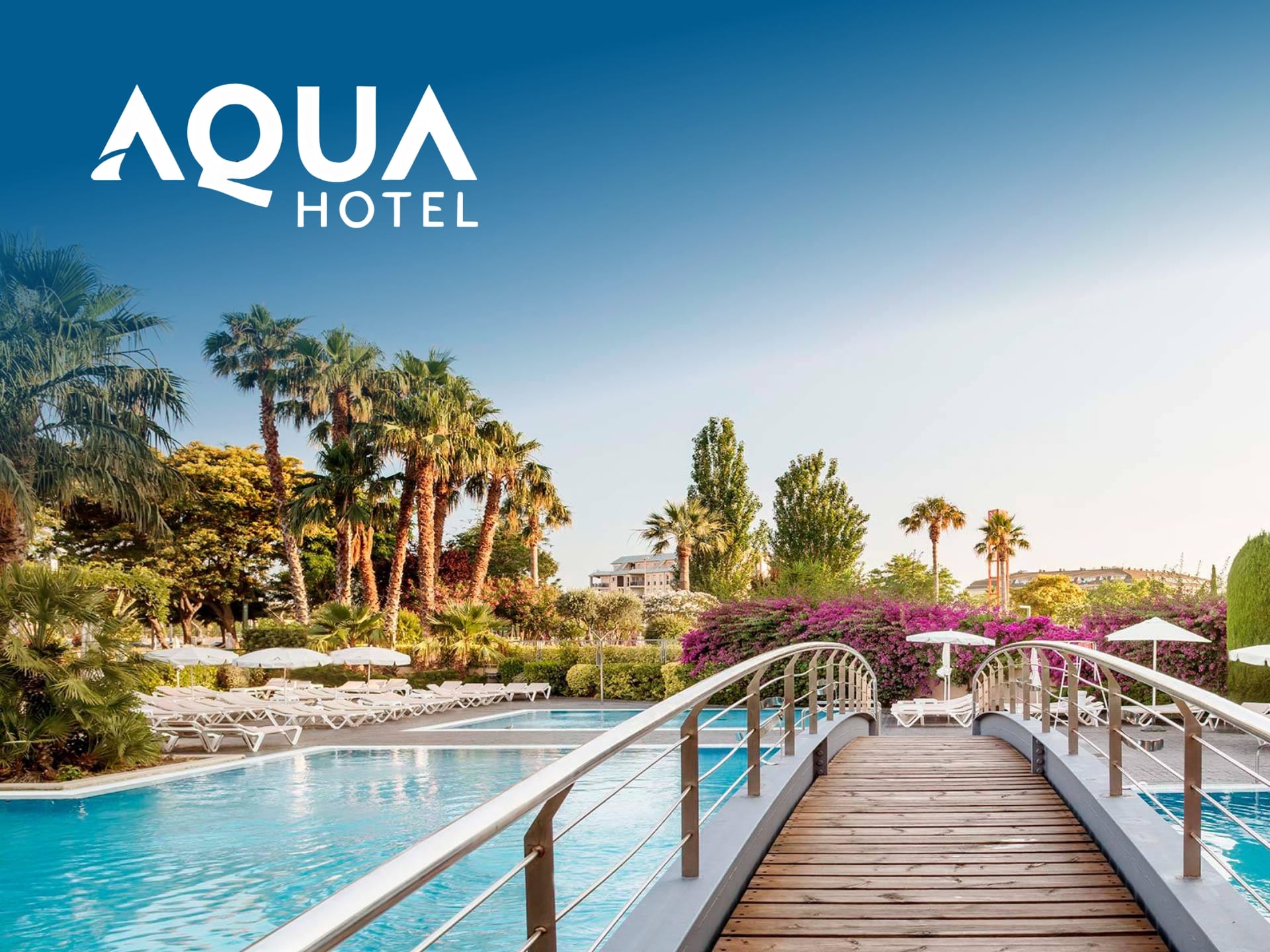 Aqua Hotel exterior view, showcasing modern architecture and inviting atmosphere. Perfect for a relaxing getaway. Book your stay now!