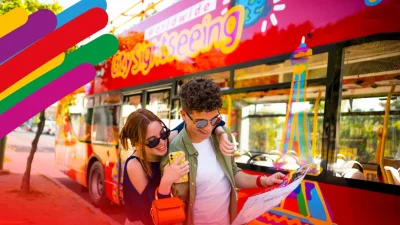 City Sightseeing open-top bus touring historic London landmarks for tourists seeking affordable travel deals.