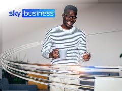 Sky Business cover image: Modern cityscape at sunset, representing growth and opportunity. For business solutions and enterprise services.