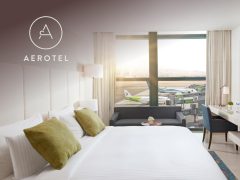 Aerotel brand cover image: Modern airport lounge with comfortable seating and charging stations, ideal for travelers seeking relaxation and convenience.