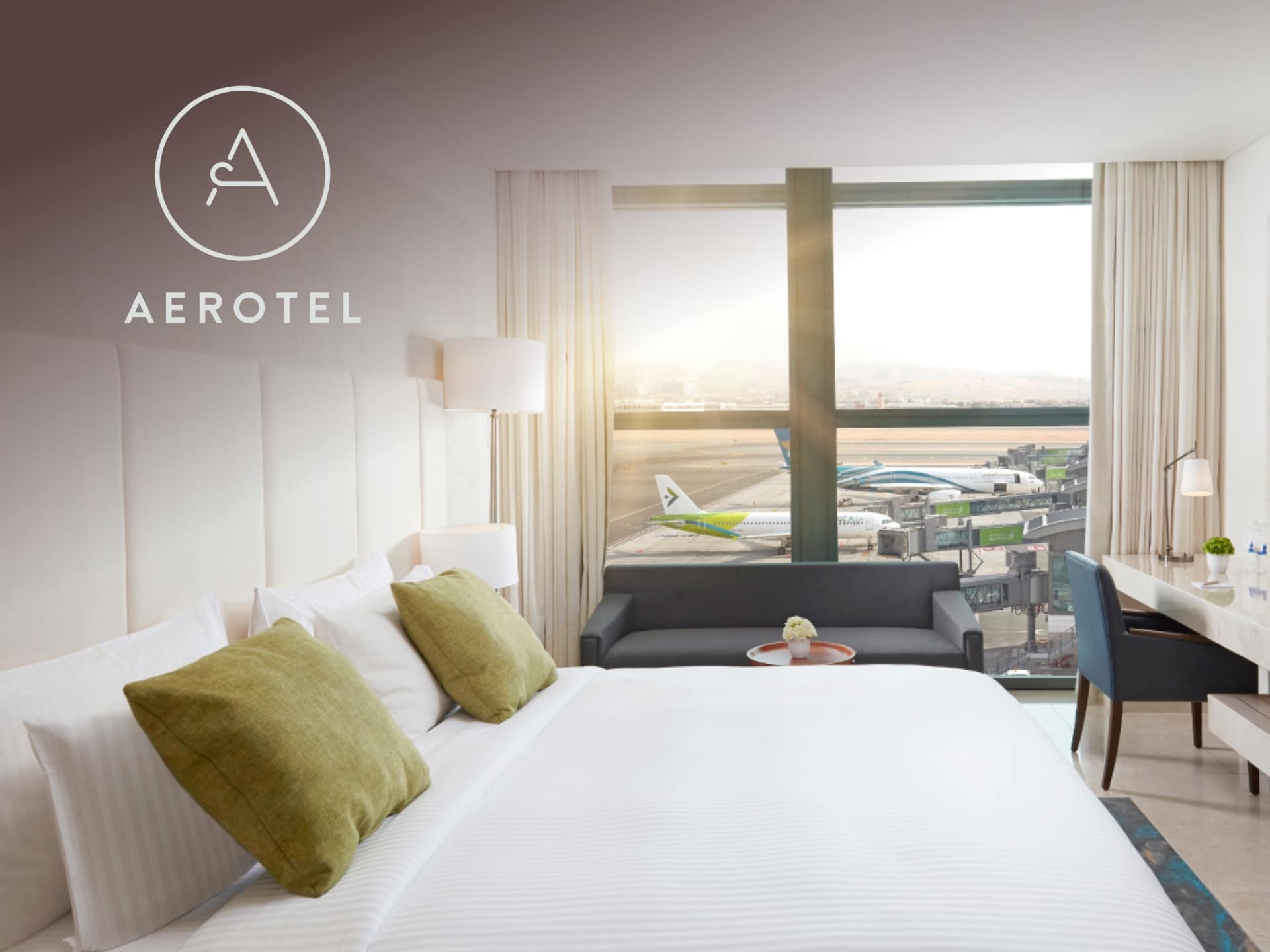 Aerotel brand cover image: Modern airport lounge with comfortable seating and charging stations, ideal for travelers seeking relaxation and convenience.