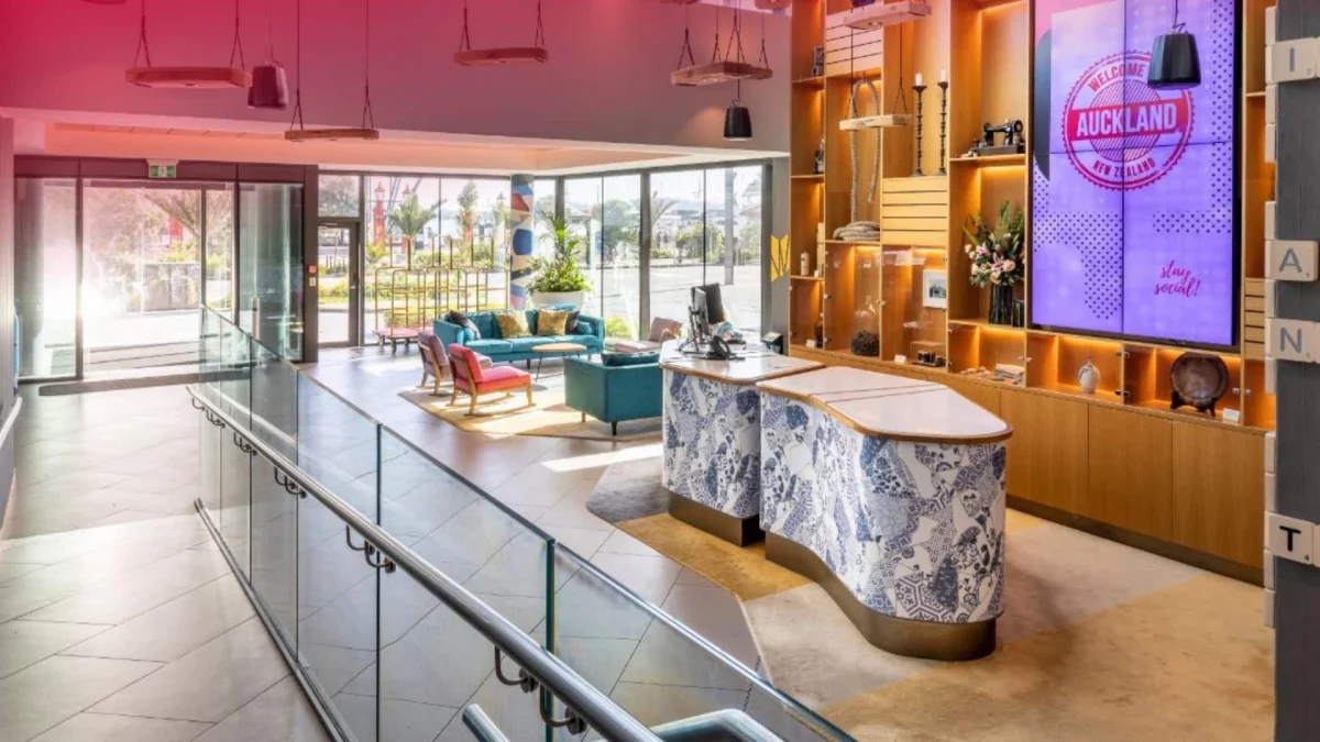 Luxury Millennium Hotels exterior view featuring modern architecture and elegant entrance for guest bookings.
