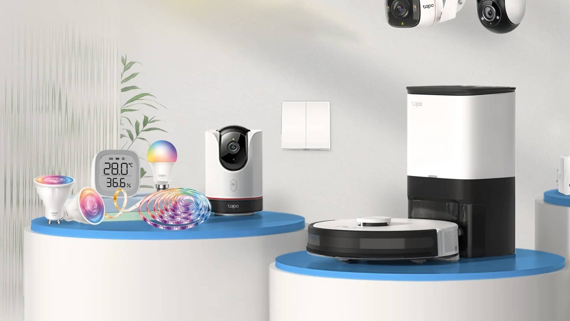 Tapo smart home security camera and lighting products displayed on a clean, modern background for UK smart home setups.