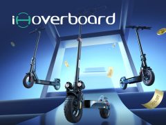 iHoverboard electric hoverboard rider cruising on pavement, showing off the self-balancing scooter. Shop iHoverboard for the best deals!