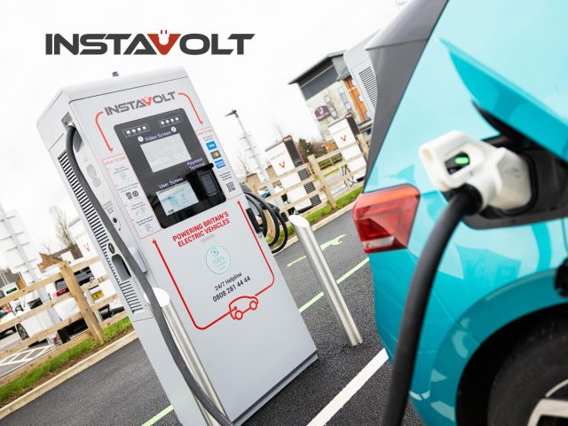InstaVolt electric vehicle charging station with a car plugged in. Fast EV charging for electric cars. Find a charging point near you.