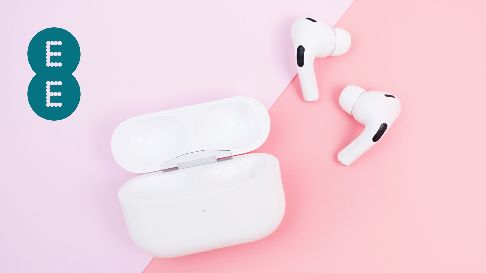 White Apple AirPods Pro earbuds and open charging case with EE logo