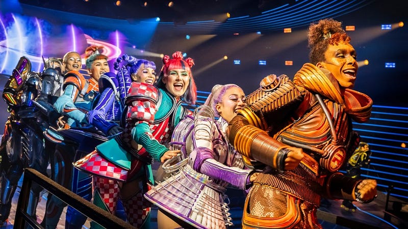 London's West End: A vibrant street scene with theaters and show posters, highlighting top musicals and cheap tickets for bf_review.