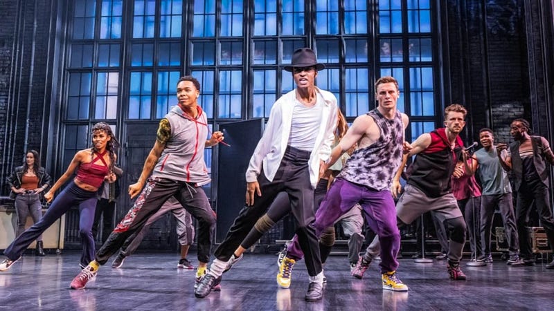 London's West End musicals: A vibrant scene from a popular show, discover top shows and cheap tickets for a memorable theater experience.