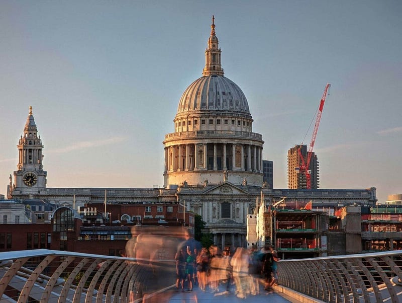 Harry Potter filming location in London, Scotland. Diagon Alley set in a bustling street. Tourist exploring the magical street.