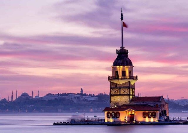 Scenic view of Cappadocia, Turkey: Fairy chimneys, hot air balloons, and unique landscape. Travel guide for Türkiye.