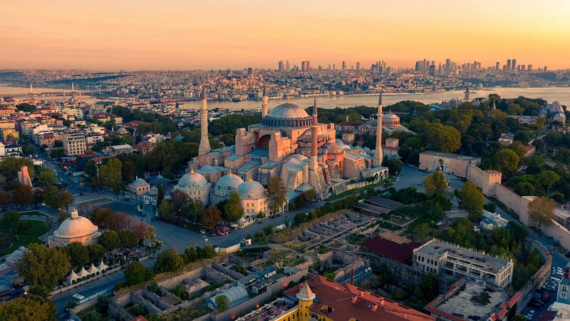 Scenic view of Cappadocia's fairy chimneys at sunrise, Türkiye. Unique landscape, hot air balloons, travel guide, hidden gems.