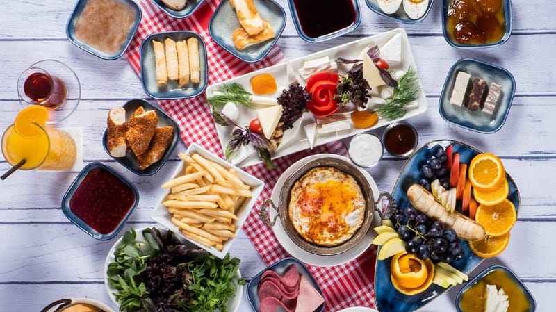 Scenic view of Cappadocia, Turkey - fairy chimneys, hot air balloons, unique landscape. Travel guide for Türkiye.