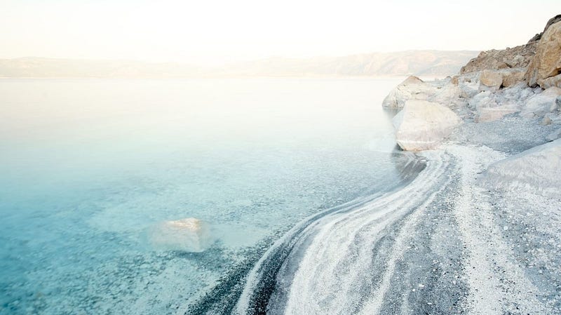 Scenic view of Cappadocia, Turkey with hot air balloons at sunrise. Unique landscape, travel destination, Turkish tourism.