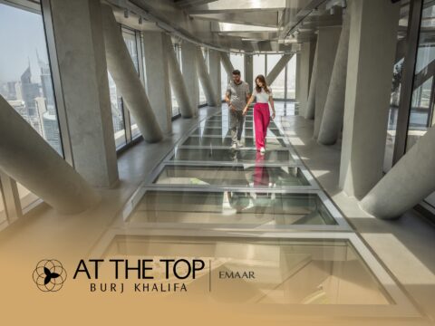 Panoramic Dubai city centre view from At The Top, Burj Khalifa observation deck. Book tickets for exclusive deals.