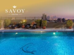 Exterior view of Savoy Dubai luxury hotel apartments with modern architecture in Dubai city centre.