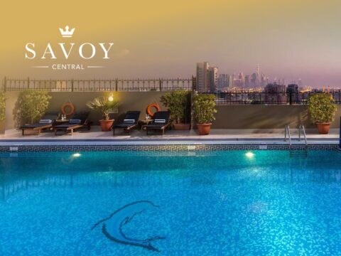 Exterior view of Savoy Dubai luxury hotel apartments with modern architecture in Dubai city centre.