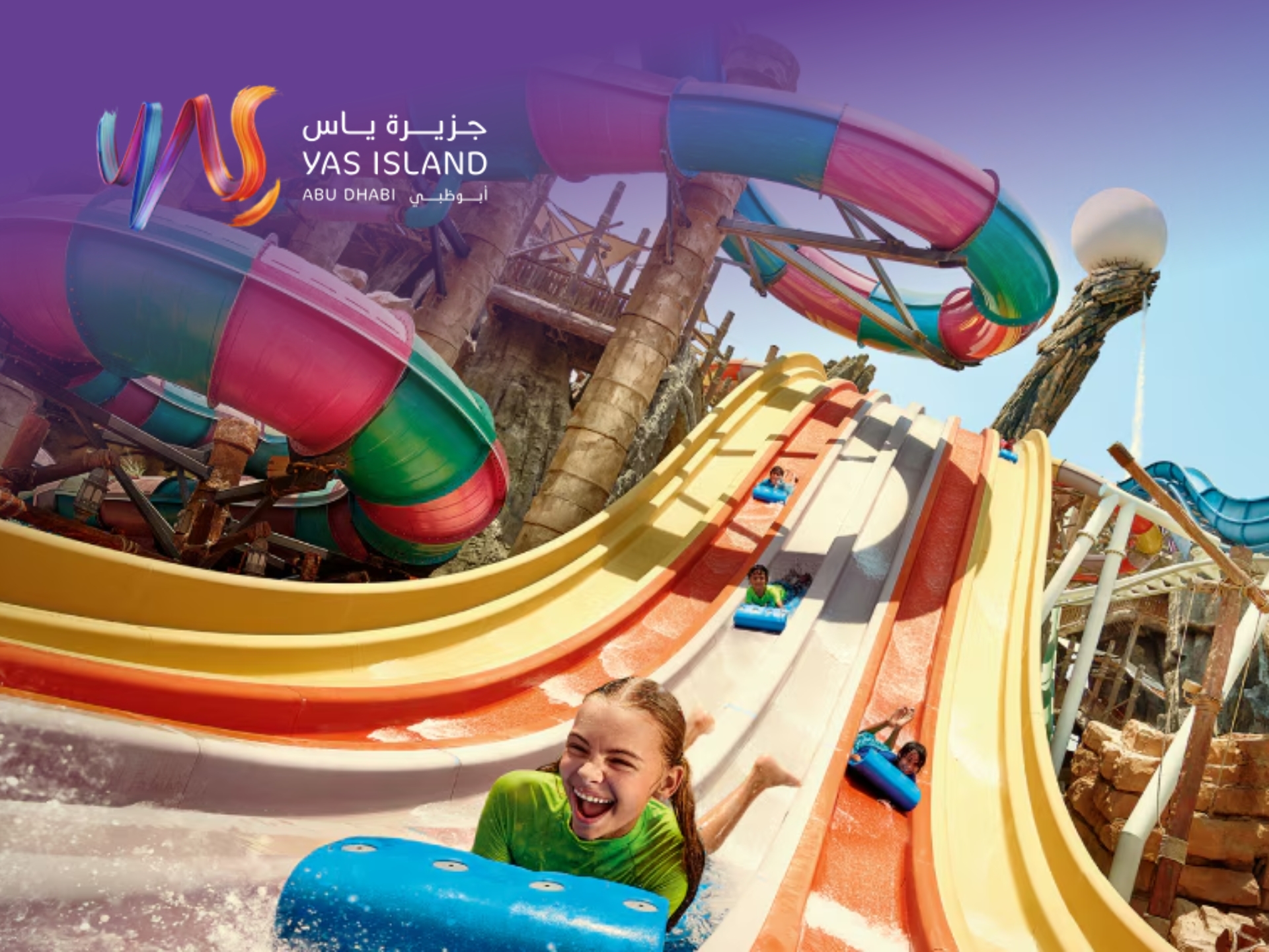 Aerial view of Yas Island Abu Dhabi theme parks and luxury resorts for family holidays and leisure trips.