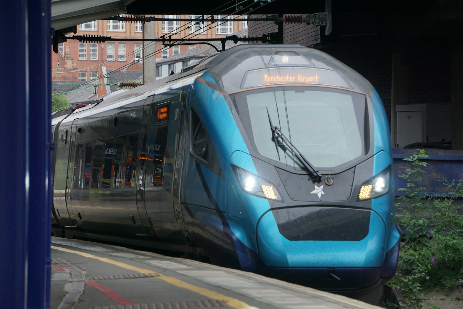 Transpennine Express Class 397 Civity train arriving at Manchester Piccadilly station for Manchester Airport.