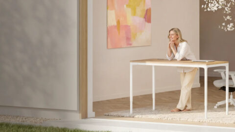 Desktronic electric standing desk in a modern UK home office setup, perfect for remote work and ergonomic comfort.