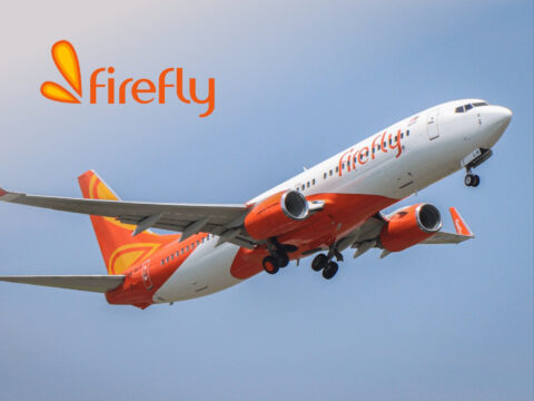 Firefly Airlines Firefly Airlines aircraft on the runway, showcasing travel deals and budget flights for holiday travellers.