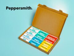 Peppersmith sugar-free xylitol mints and chewing gum packs arranged on a colourful background for healthy teeth.