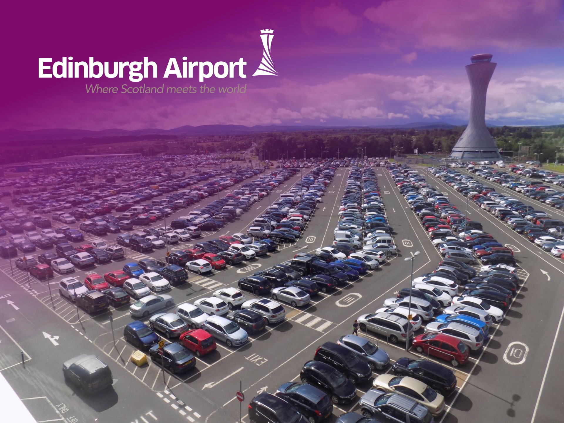 Edinburgh Airport parking facility with cars parked, ready for travellers. Book secure and convenient airport parking.