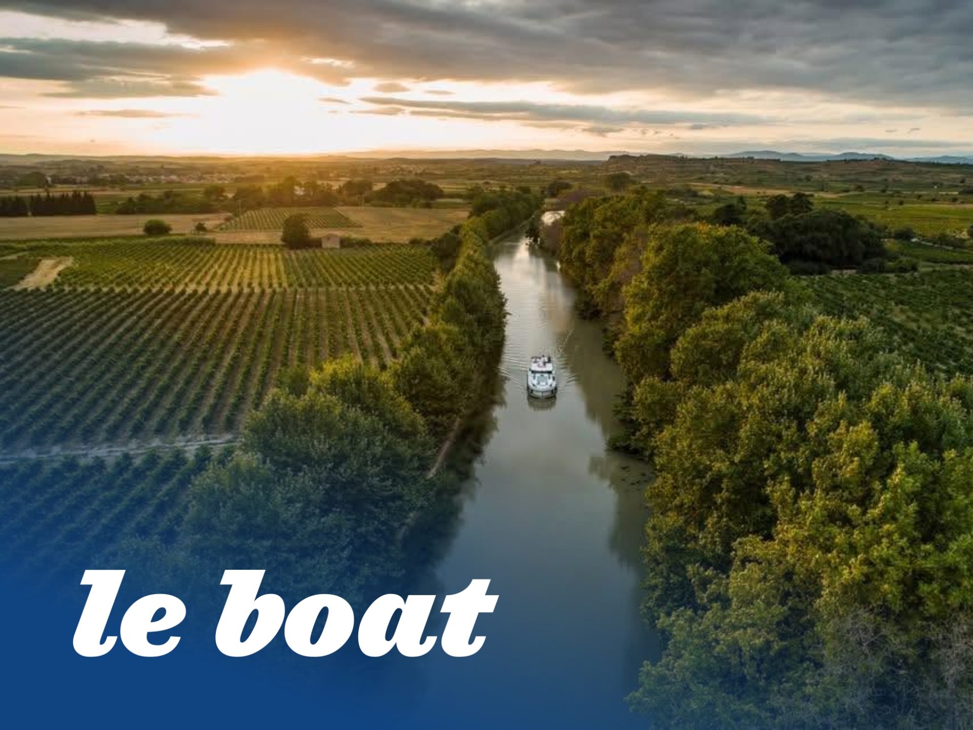 Le Boat holidaymakers enjoying a canal boat cruise, perfect for UK family holidays and boating deals.