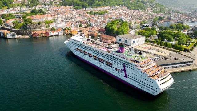 Ambassador Cruise Line ship sailing on the ocean, representing luxury cruise holidays and travel deals.